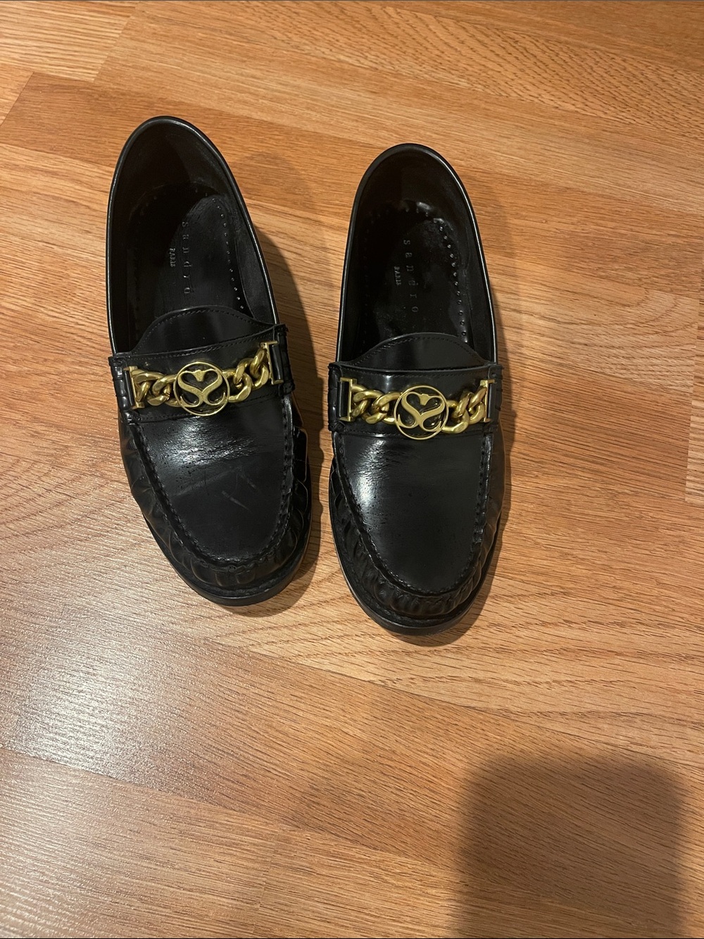 Sandro Black Leather Loafers with Gold Chain Detail